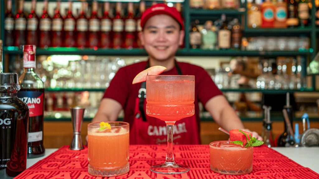 staff mixing cocktails ingredients